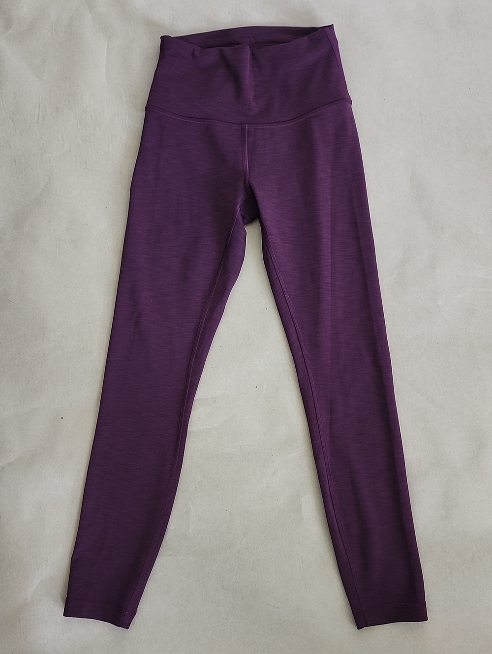 Lululemon- Wunder Train HR Tight 25". Plum Color, Great Condition